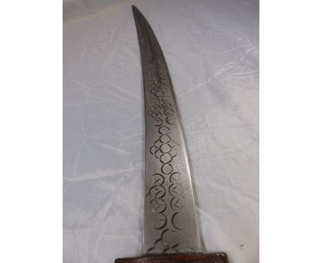 ORIENTAL SWORD. Oriental sword in leather scabbard with two skinning knives