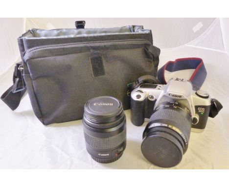CASED CANON CAMERA. Cased Canon EOS 500N camera and lenses