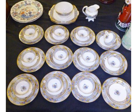 WETLEY TEA SERVICE. Wetley tea service in floral and fruit design with gilt edging, thirty nine pieces