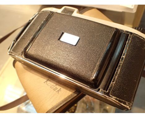 Cased Kodak folding camera