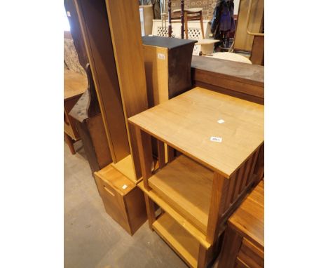 Pair of light oak side tables with lower shelf and small stool and tall open cabinet