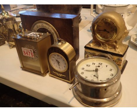 Five mixed clocks to include modern brass carriage clock and ceramic mantel clock CONDITION REPORT: Lot comprises; carriage c