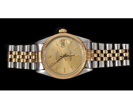 A Gentleman’s Rolex Oyster Perpetual Datejust Wristwatch the gold dial with hourly applied baton markers, sweep seconds hand 
