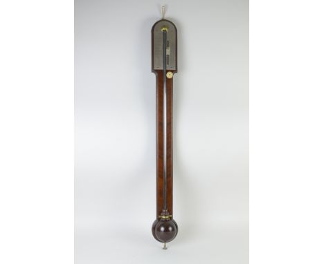 A George III mahogany Stick Barometer by T. Blunt with arched top and silvered dial, angled veneers and exposed tube, 3ft 1in