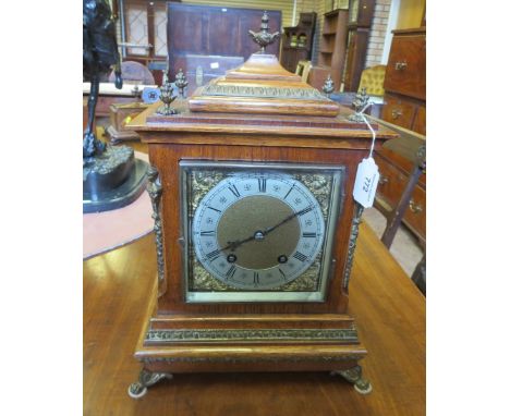 A 19th Century oak cased Bracket Clock with silvered chapter ring, two train striking movement in architectural case having g