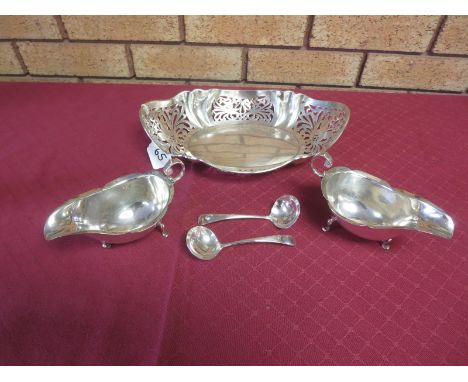 A George V silver pierced oval Dish, Sheffield 1925, 11 1/2in, maker: J,R & S, pair of silver Sauce Boats, London 1919, and p