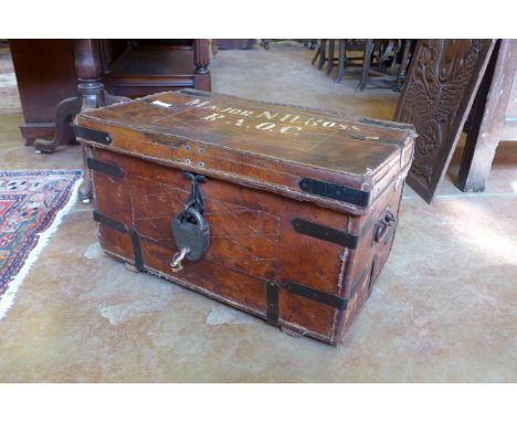 A leather and iron bound Travelling Trunk, bearing painted name Major N.H. Ross R.A.O.C., with heavy padlock, 2ft 2in W x 1ft