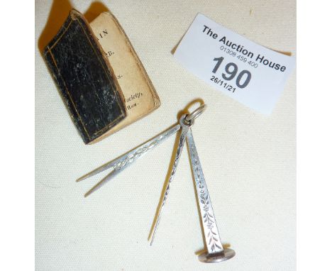 Silver fob pipe cleaner hallmarked for Birmingham 1900, and a miniature religious book dated 1835