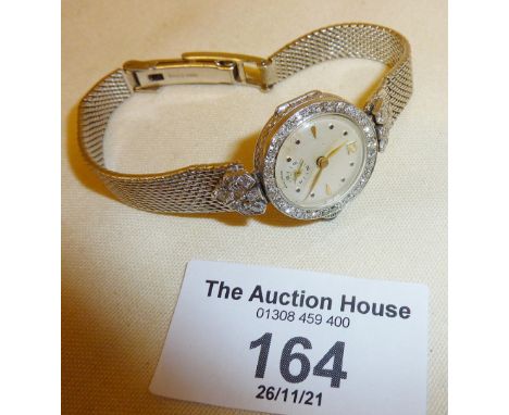 Vintage 9ct white gold and diamond ladies wrist watch with 9ct white gold strap or bracelet marked as DS &amp; S