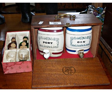 Presentation W. &amp; A. Gilbey Ltd mahogany cabinet enclosing two Wade china gin and port barrels and two miniature Benedict