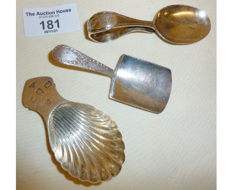 Sterling silver caddy spoons and a child's pusher spoon, all hallmarked. Total weight approx. 53g