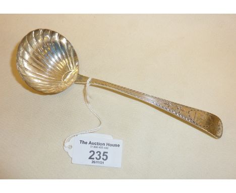 Fine Irish silver cream ladle, with scalloped bowl and bright cut engraved decoration, hallmarked for Dublin 1789, John Dalry