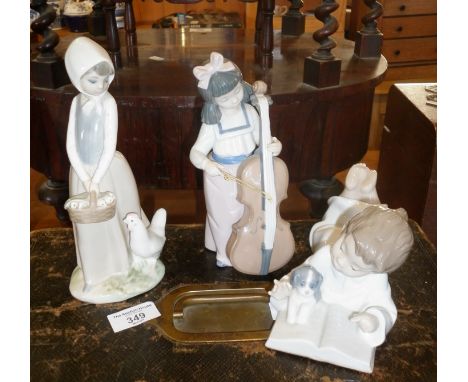 A Nao girl with double bass figure, a boy reading with puppy figure and a Zraphin girl figurine