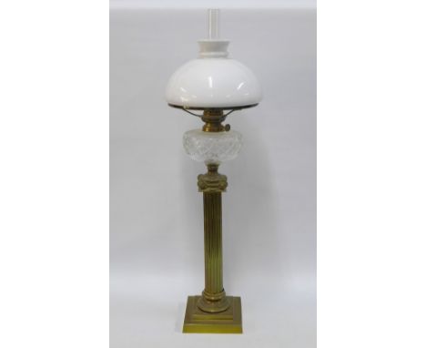 Brass corinthian column oil lamp with white glass shade, 78cm 