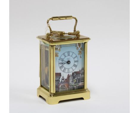 Halcyon Days brass and glass cased carriage clock, with an enamel dial, 14cm including handle 