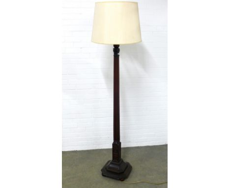 Mahogany standard lamp, fluted stem and square canted  base, classical urn decoration,  170cm high. 