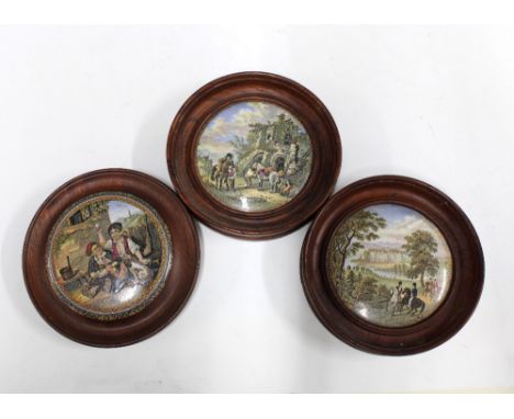 Three prattware pot lids in oak frames, 16cm (3) 