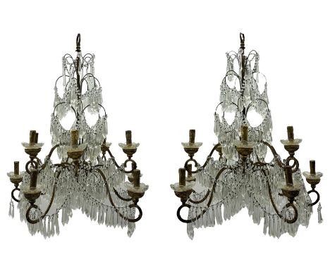 India Jane Interiors - pair of contemporary gilt bronze and crystal chandeliers, the framework featuring scrolling arms and g