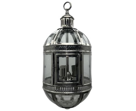 Contemporary chrome and glass hanging lantern, domed top and cylindrical body with clear glass panels, hinged door enclosing 