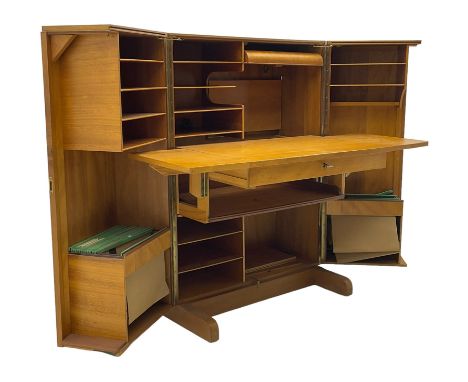 Mid-20th century walnut 'Magic Box' design metamorphic desk cabinet, two doors open to reveal sliding desk with drop leaves, 