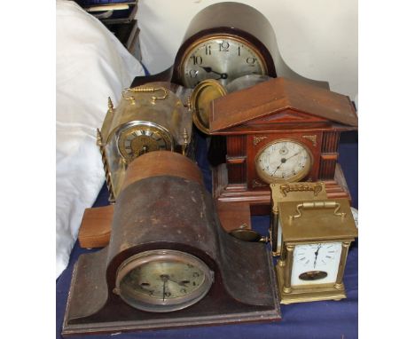A mahogany Napoleon hat mantle clock together with other clocks