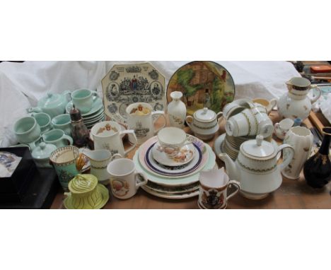 A pottery part tea service together with commemorative mugs, Noritake part tea service, Royal Doulton plates etc