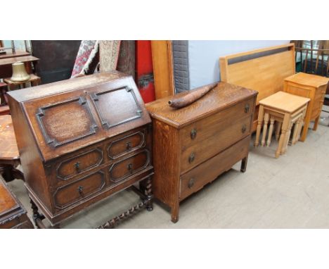 A 20th century oak bureau together with an oak chest of drawers, a modern double bed, bedside cabinet, nest of drawers and a 