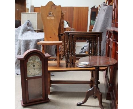 A hardwood coffee table together with a back stool, an oak nest of three tables wall clock and occasional table 