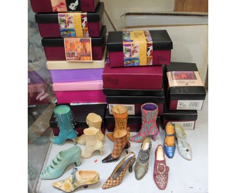 A collection of 'Raine' model shoes with boxes