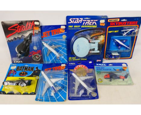 ERTL - Galoob - Matchox - 8 carded  diecast items to include #5346 Star Trek The Next Generation U.S.S. Enterprise Starship, 