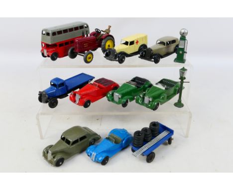 Dinky - 10 unboxed vintage Dinky diecast vehicles to include Ambulance #30F, Massey Harris Tractor #300, Flatbed Truck 25C an