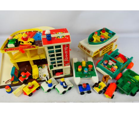 Fisher Price - An assortment of loose vintage Fisher Price toys in mostly good condition to include Servicing center #930, Fa
