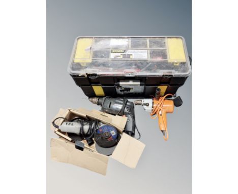 A tool chest and several power tools including drill and angle grinder 