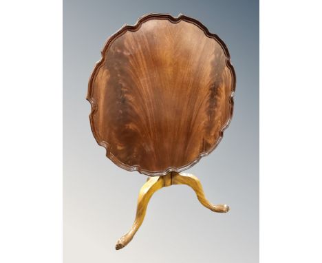 A George III style mahogany tripod tilt top occasional table, diameter 63 cm 