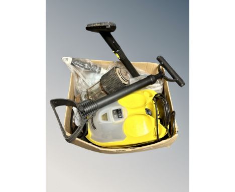 A Karcher steam cleaner in box and an antique miner's lamp