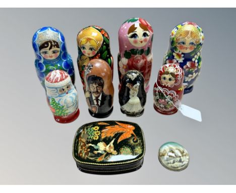 Eight Russian lacquered wood Babushka dolls, further trinket box and brooch 