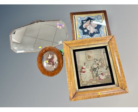 A Victorian tapestry in bird's eye maple frame, two further tapestries and a shaped mirror 