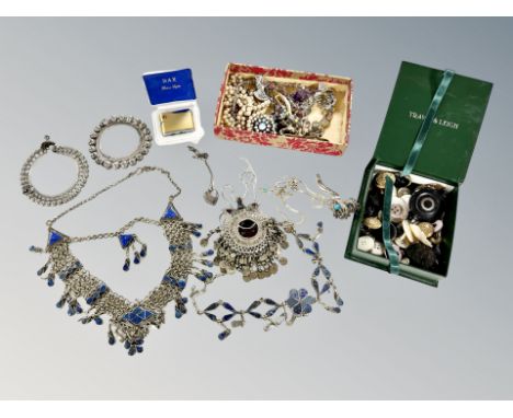 A collection of Eastern white metal jewellery, Lapis lazuli decorated necklaces, costume jewellery, military buttons, box lig