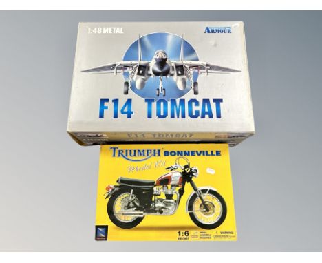 An Armour Collection 1:48 F 14 concat jet together with a further Newray Triumph Bonneville 1:6 scale motorbike 