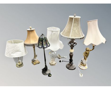 A gilt gesso cherub table lamp (a/f), together with a Tiffany style lamp and four others (6)