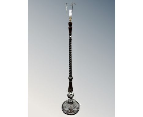 A carved barleytwist standard lamp together with a further metal figural table lamp 