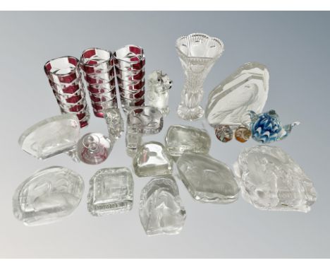 A collection of glass paperweights, vase, two tone ruby glass vases etc (two trays)