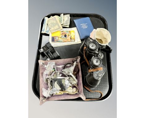 A pair of Pathescope 10 x 50 binoculars, pair of binoculars, humorous postcards, bank notes, decimal coin set, coins and watc