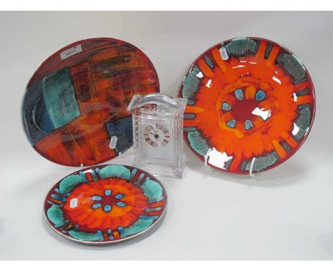 Poole Pottery Circular Dishes in Traditional Flame Abstract Designs, both 26cm diameter, a smaller plate. Royal Albert crysta