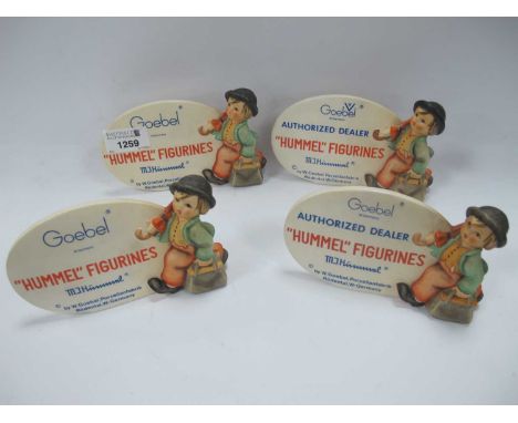 'Hummel Figurines' Oval Display Plaque, free standing with boy to side, 9cm high 14.5cm wide, another, 'Authorised Dealer' (x