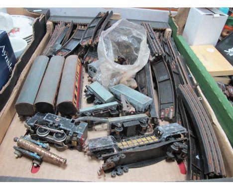 Trix TTR Railway Engine, crane, carriages, straights and curves track, etc (rusting):- One Box.