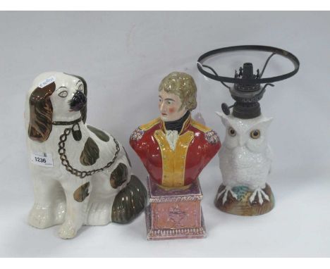 StaffordshirePottey Pearlware Bust of Wellington, on pink lustre base decorated with urns, 22cm high.pottery spaniel, contine