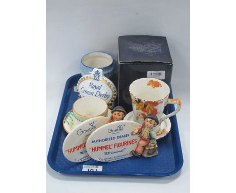 'Hummel Figurines' Oval Display Plaque, free standing, with boy to side, 9cm high 14.5cm wide, another 'Authorised Dealer'; R