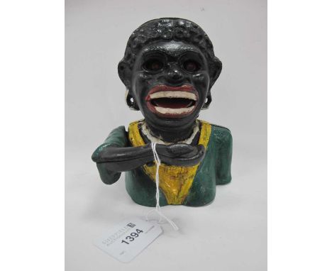 Painted Cast Iron 'Dinah' Money Box.These items are listed on the basis they are illustrative of a bygone culture in which th
