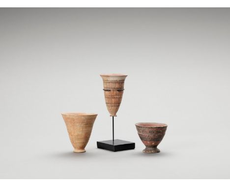   THREE CERAMIC MEHRGARH AND HARAPPAN DRINKING CUPS  Indus Valley, Pakistan, Neolithic period (c. 5500 BC – 4500 BC). Three c